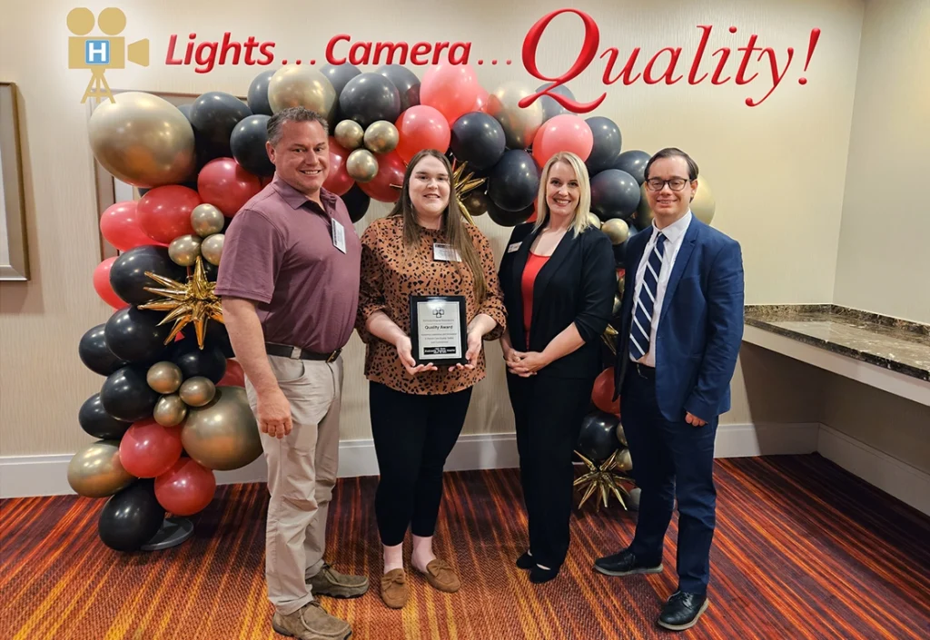 Casey Franklin presents the KHA 2024 Quality Conference 'Hospitals with Fewer Than 100 Beds' Award to Rockcastle Regional Hospital