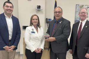 Pictured left to right are State Representative Aaron Thompson; UK King’s Daughters Medical Center President and CEO Sarah Marks; State Representative Scott Sharp; and KHA Senior Vice President of Policy and Government Relations Jim Musser.