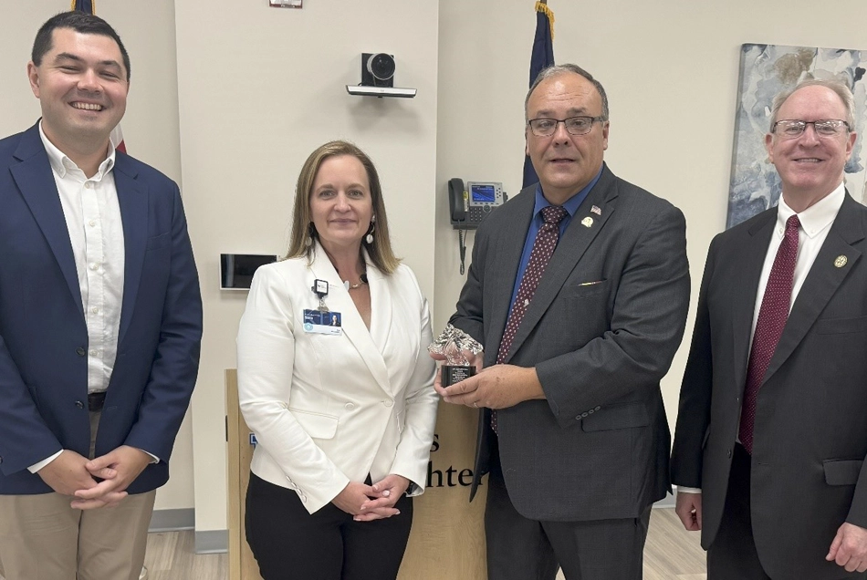 Pictured left to right are State Representative Aaron Thompson; UK King’s Daughters Medical Center President and CEO Sarah Marks; State Representative Scott Sharp; and KHA Senior Vice President of Policy and Government Relations Jim Musser.