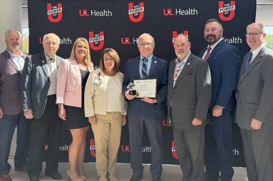 Senator Mike Nemes (Center) along with the UofL Health team and KHA Senior Vice President of Policy and Government Relations (second from right).